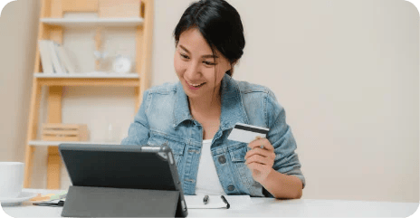 beautiful-smart-business-asian-woman-using-tablet-buying-online-shopping-by-credit-card-while-wear-smart-casual-sitting-desk-living-room-home-lifestyle-woman-working-home-concept