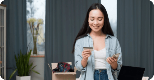front-view-woman-ordering-online-while-looking-credit-card