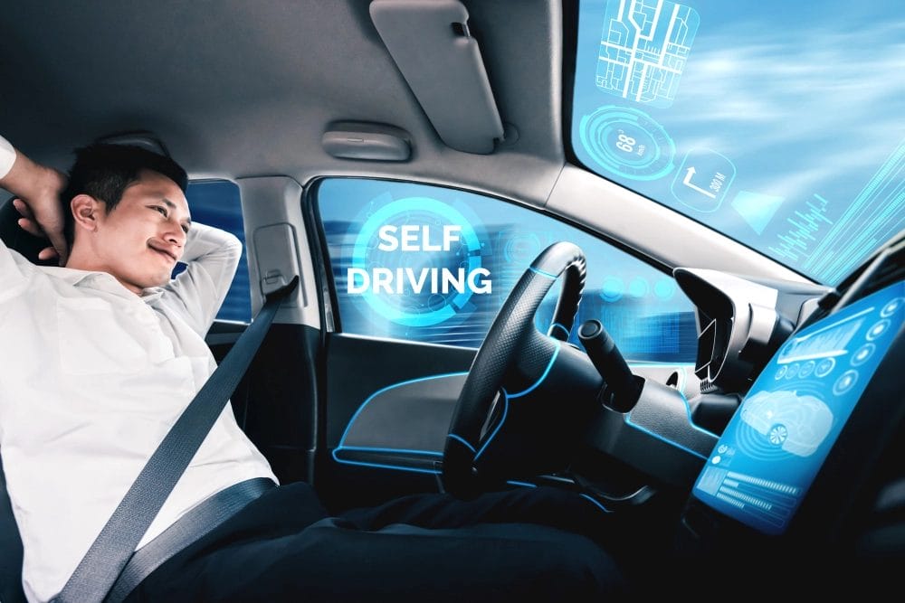 self-drive-autonomous-car-with-man-driver-seat