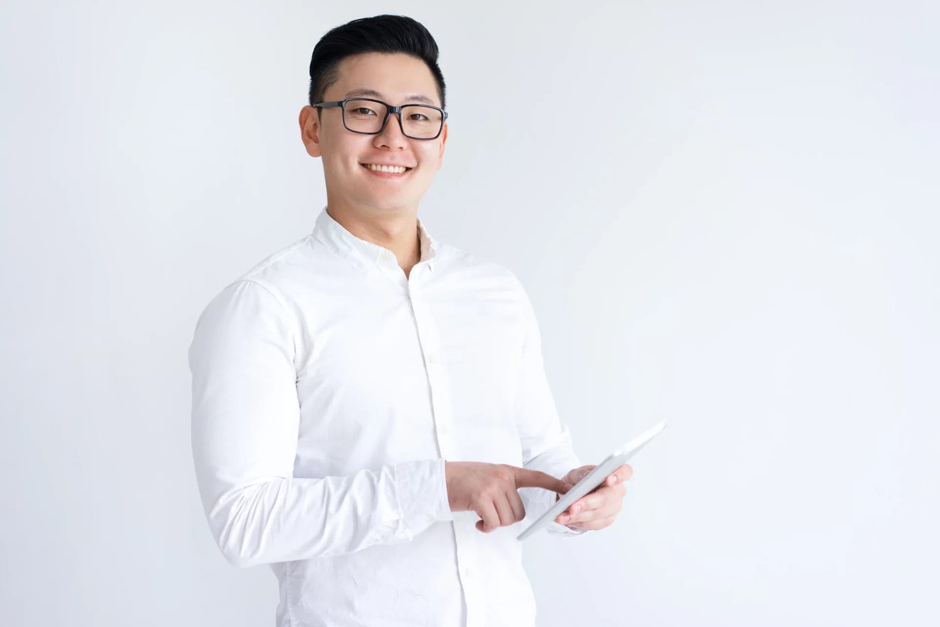 smiling-asian-man-using-tablet-computer